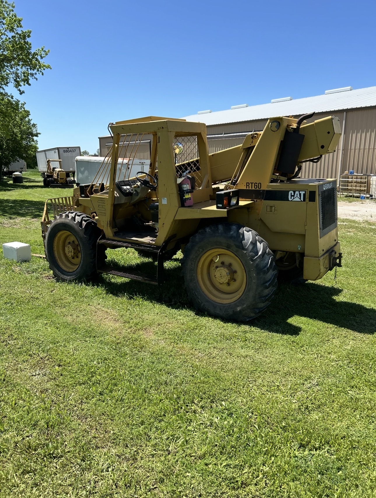 Older CAT telehandler that may be outdated but still has resale, rebuild, or parts value